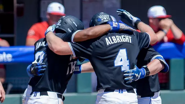 Tyler Albright celebrates with teammates