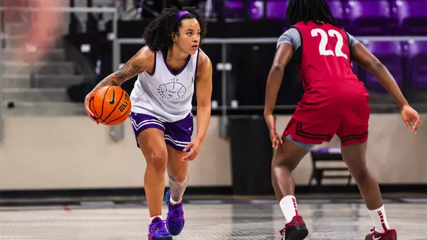 Jadyn Wooten dribbles with her right hand
