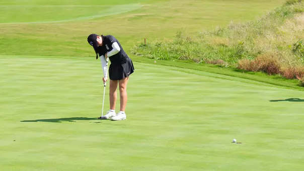 Gracie McGovern watches a birdie putt roll into the hole