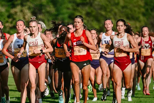 Hannah Gapes in group at Sean Earl Loyola Lakefront Invitational