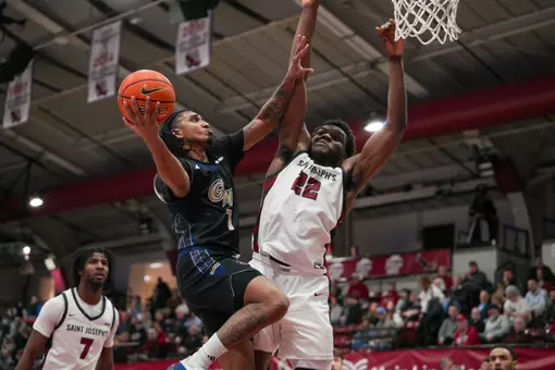 Jean Aranguren attempts a layup at Saint Joseph's