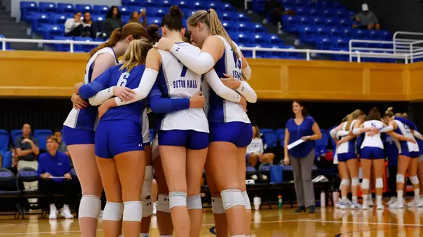 Seton Hall volleyball team huddles during its match against Iona on Sept. 5