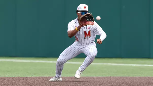 Paul Jones II fields a ground ball in a game against Michigan