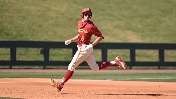 Dean Carpentier on the base path in second game against Illinois.