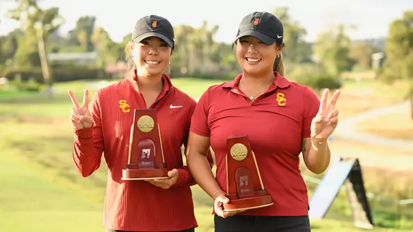 Jasmine Koo and Catherine Park pose with trophies after the final round of stroke play at the 2026 NCAA Championships