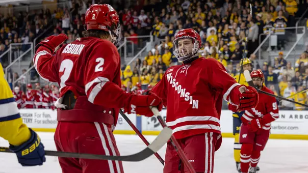 Aiden Dubinsky and Luke Osburn celebrate a goal