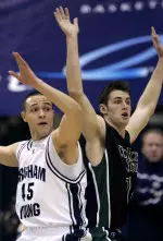 Jason Smith (14) and Brigham Young guard Jonathan Travernari (45) fight for position. (AP Photo)