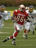 Montrell Jones returns a punt 54 yards during second quarter action of their game against East Carolina Saturday Oct. 2, 2004 at Papa John's Cardinal Stadium in Louisville, Ky. (AP Photo/Timothy D. Easley)