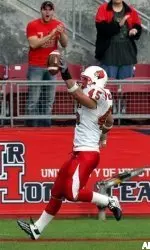 Louisville's Adam McCauley celebrates his 31-yard touchdown reception against Houston during the first quarter.