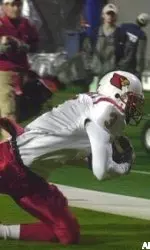 J.R. Russell lands in the end zone for a touchdown during the first quarter.