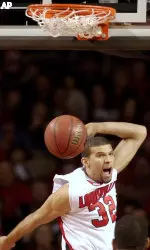 Francisco Garcia yells out after getting behind the TCU defense for a dunk during the first half.