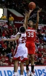 Louisville's Angel McCoughtry (35) shoots over Rutgers' Cappie Pondexter (25) during a college basketball game Saturday, Jan. 21, 2006, in Piscataway, N.J. Rutgers won 80-55. (AP Photo/Mel Evans)