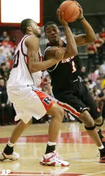 Louisville's Terrence Williams (1) moves into the lane past Rutgers' Jaron Griffin during the first half of a Big East Conference basketball game at the Rutgers Athletic Center in Piscataway, N.J. Saturday, Jan. 28, 2006. (AP Photo/Rich Schultz)