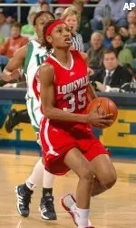 Angel McCoughtry drives the lane for a basket during the first half.