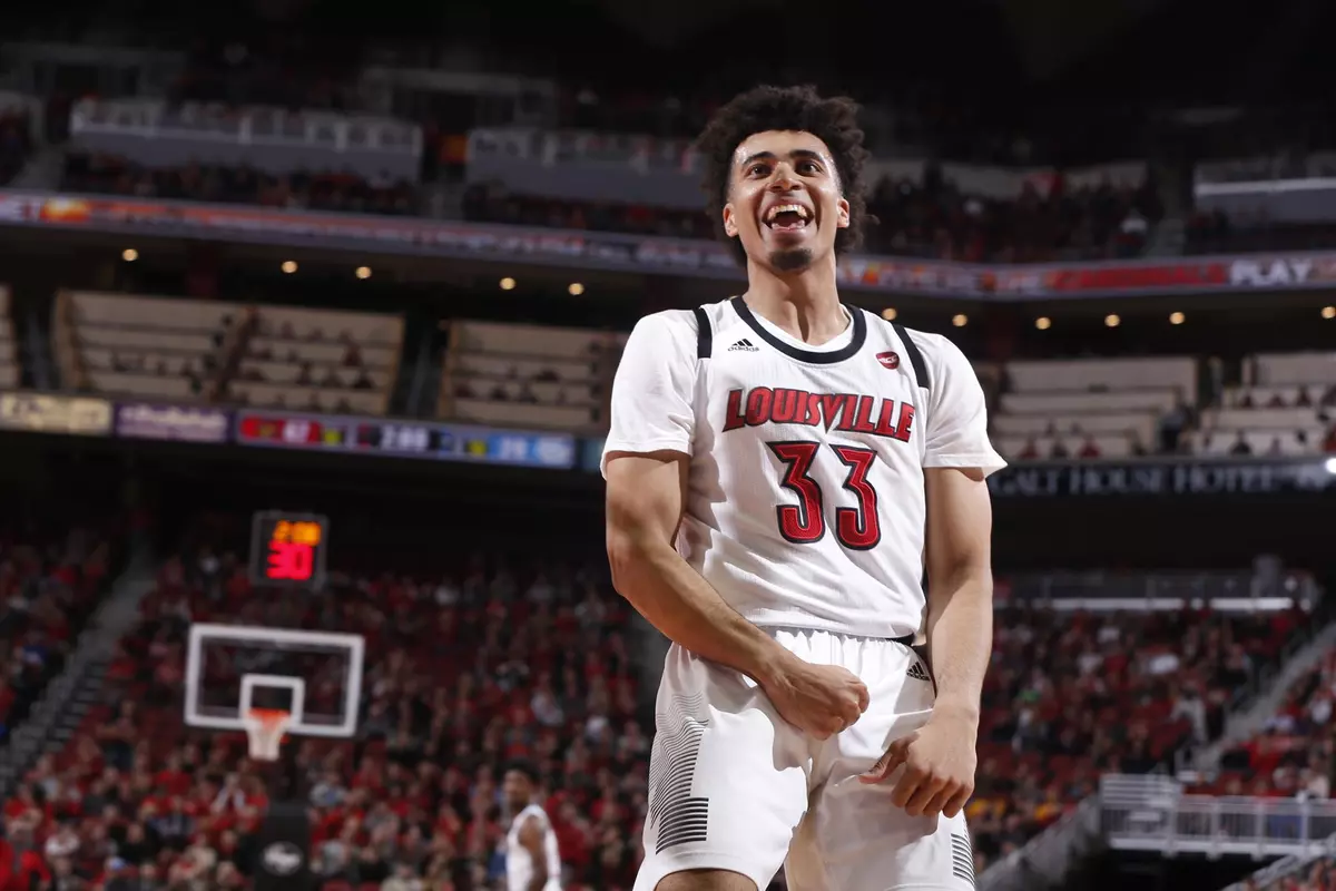 Jordan Nwora celebrates after scoring a dunk against Southern