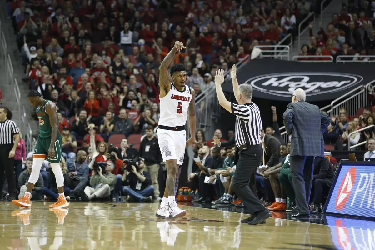 Malik Williams celebrates after making a three-pointer against Miami