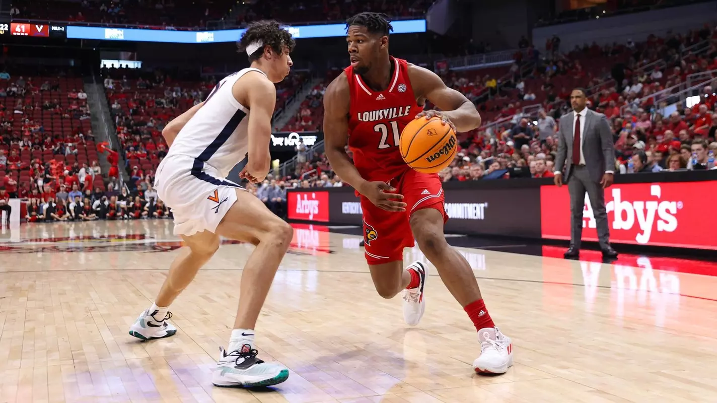 Sydney Curry backs down a Virginia defender