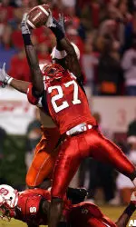 Troy Graham intercepts a pass intended for Miami's Kevin Everett, back, during the sceond quarter.