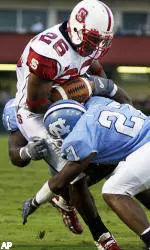 North Carolina State's Bobby Washington (26) rushes during the first half.