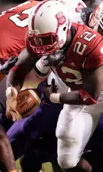 Tony Baker has the ball stripped by Jamaal Fudge during the first half Thursday.
