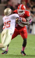 Shadrach Thornton carries the ball against Florida State.