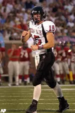 Texas Tech quarterback Sonny Combie (15) celebrates his first-quarter touchdown pass against Southern Methodist in Dallas.