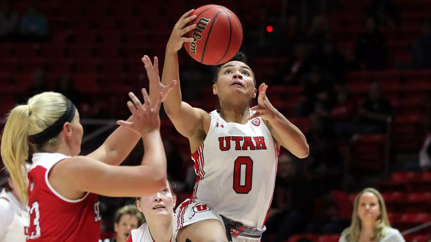 Kiana Moore drives to the basket.