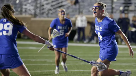 Duke's Olivia Jenner celebrates a goal with teammate Eva Greco in the ACC quarterfinals