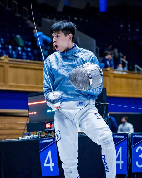 Duke fencing's Terence Lee celebrates during a match