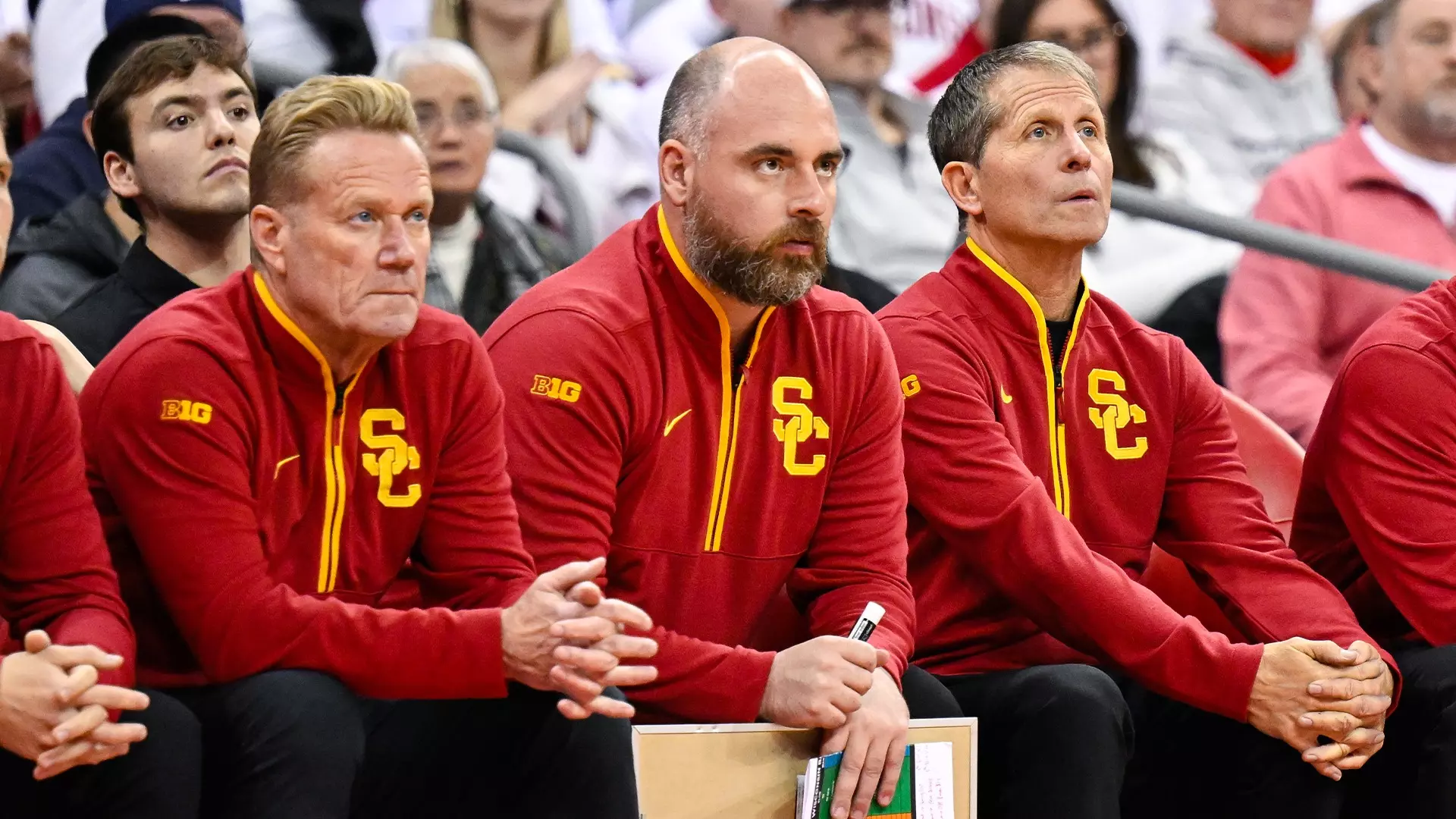Assistant coach Anthony Ruta sits on the bench during USC Men's Basketball's win at Wisconsin