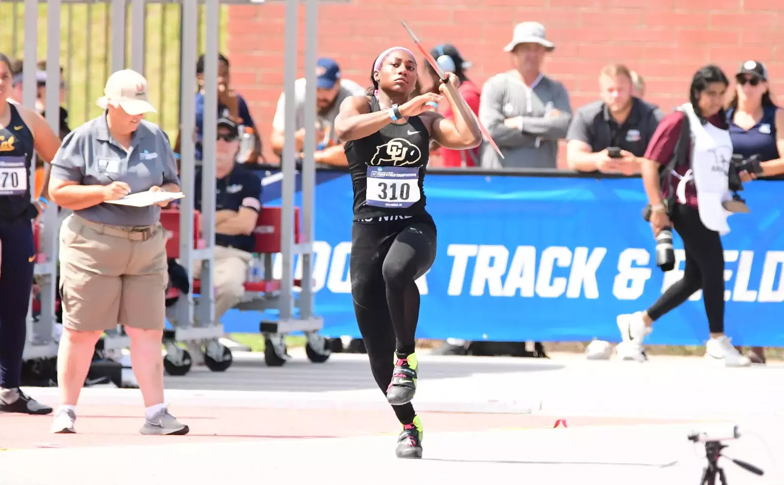 Green's Record Javelin Throw Advances Her to Finals; Jones Moves