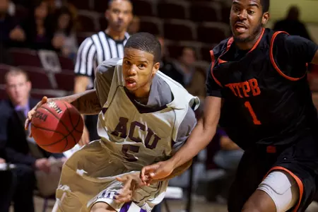 Wildcats roll Falcons, 80-69 Image