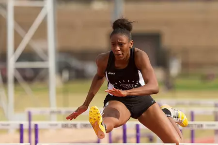 Williams breaks own hurdles record; Daniel and men's 4x400 climb top performer charts Image