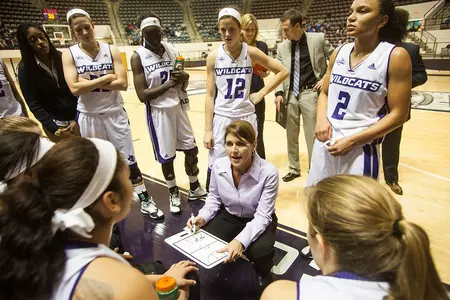 Big second half propels Wildcats past Flying Queens in 2014-15 opener Image