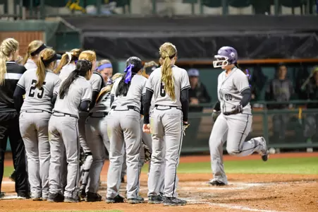 Softball plates 19 runs, launches four home runs in back-to-back defeats Image