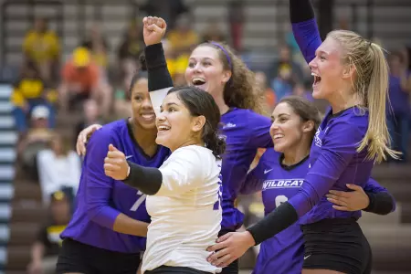 Wildcats wrangle Cowgirls in four sets Image