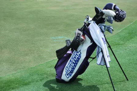 An Abilene Christian golf bag rests outside the putting green at the Southland Conference Championship.