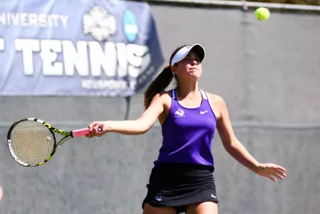 Allison Stewart returns a shot.