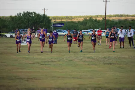 ACU women's cross country team at the starting line.