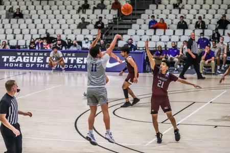 Tobias Cameron shoots from the wing against McMurry
