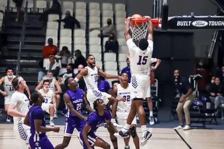 Immanuel Allen throws down a huge dunk off a feed from Reggie Miller against Tarleton State