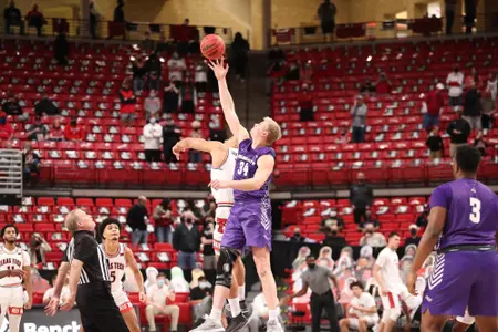 Kolton Kohl wins the tip against Texas Tech-Dec 9, 2020