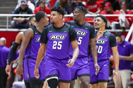 Wildcats walk up the court in a game against Utah