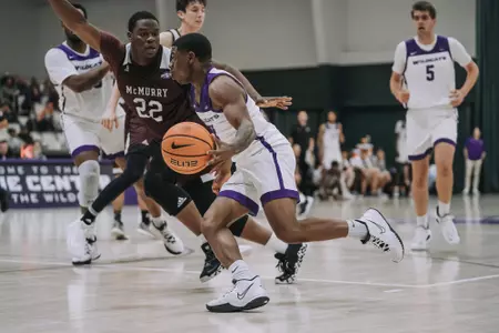 Damien Daniels drives to the basket against McMurry