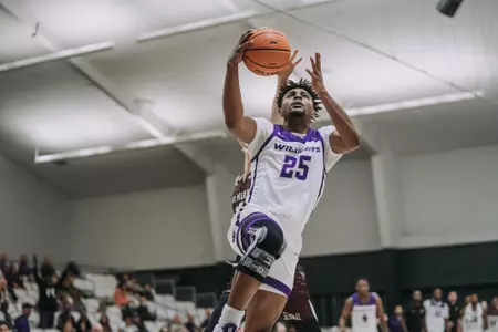 Immanuel Allen goes up for a layup against McMurry