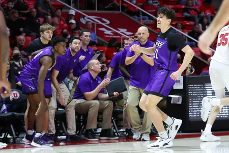 Tobias Cameron runs back down the court after a made basket against Utah