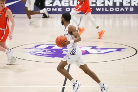 Reggie Miller brings the ball up the court against HBU