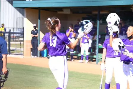 Avery Miloch crosses home plate against UNT