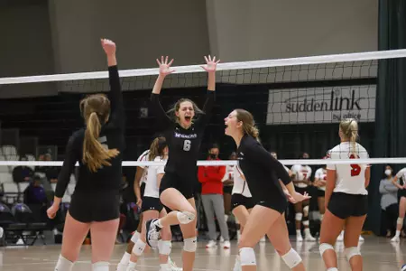 VB celebrates a point in a win over Lamar