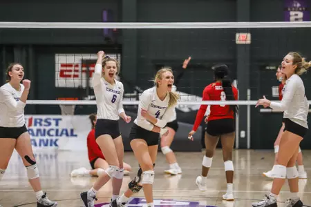 VB team celebrates a point against Nicholls